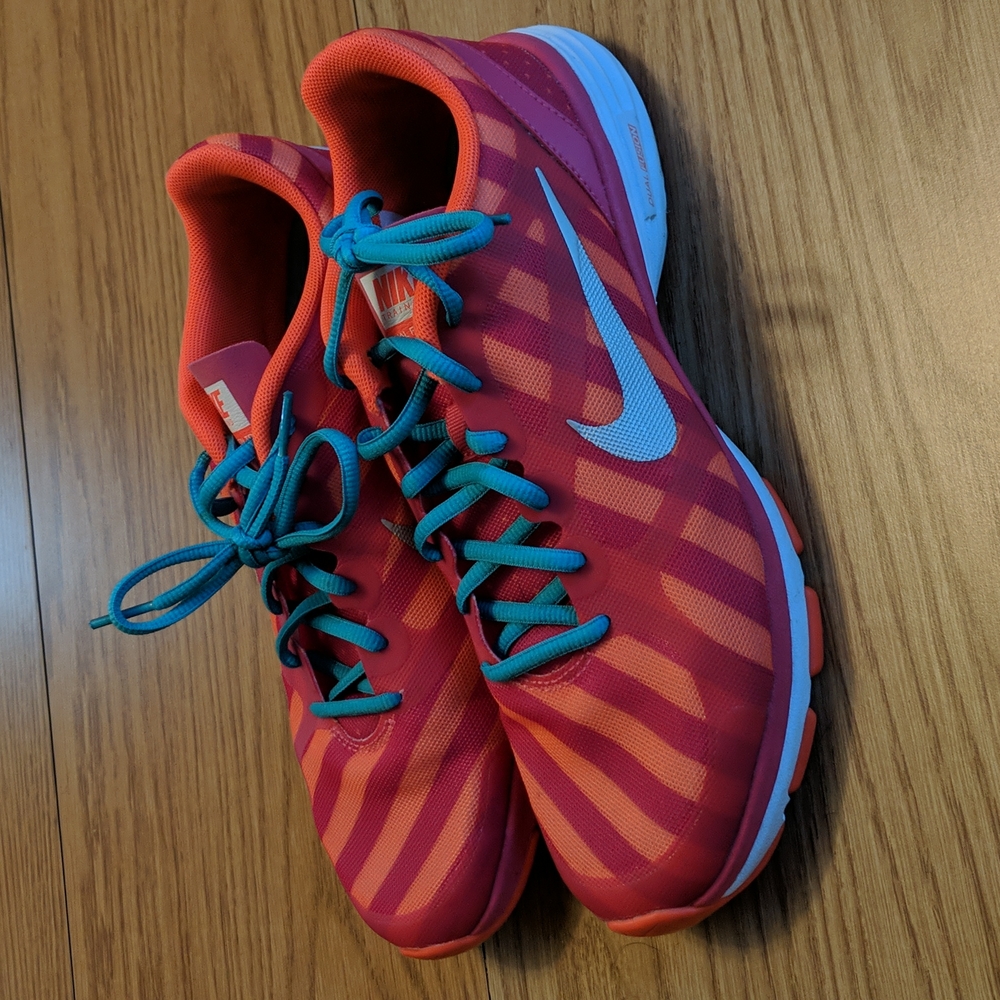 Pink and orange striped Nike sneakers 8.5